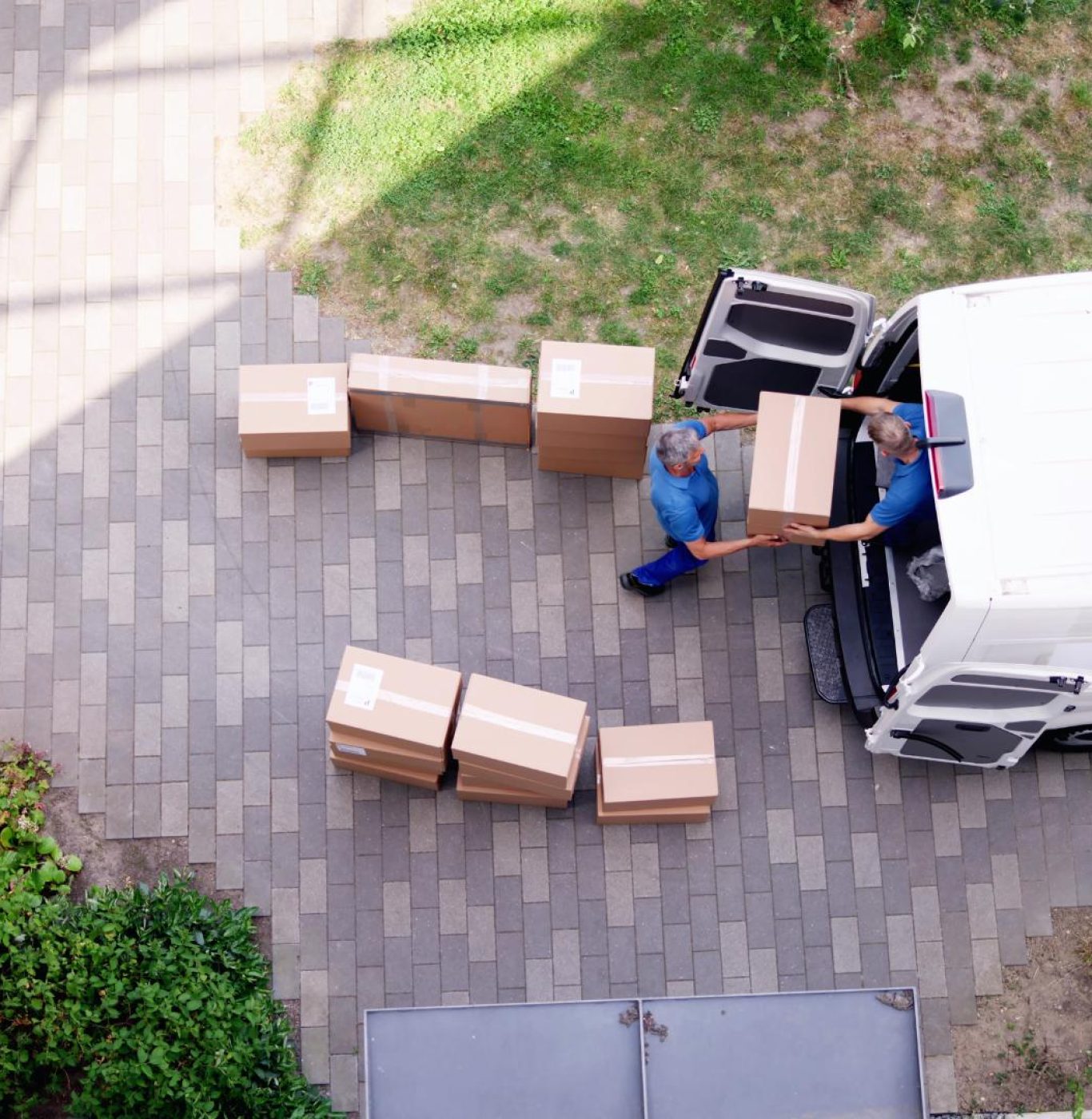 Professional local movers near me in Baytown, TX packing boxes and household items carefully