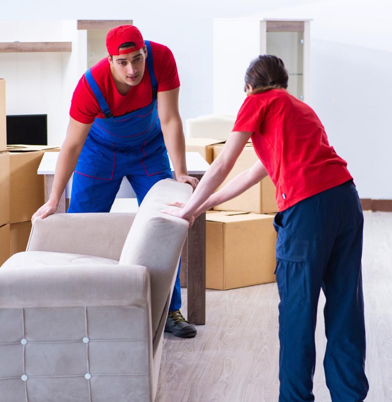 Professional movers near me in Humble, TX packing furniture and boxes carefully