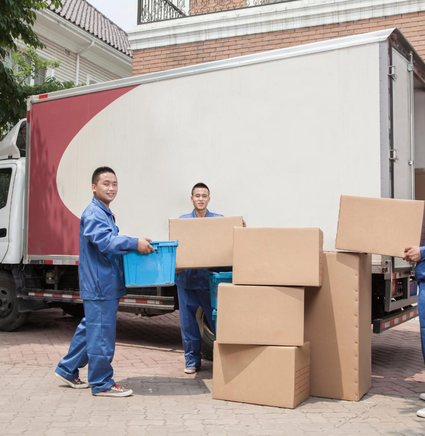 Reliable local movers in Cypress, TX loading furniture for a residential move