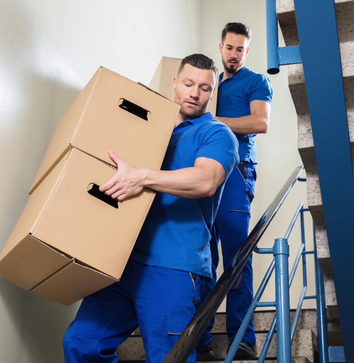 Reliable long distance movers in Austin, TX loading furniture for an interstate relocation