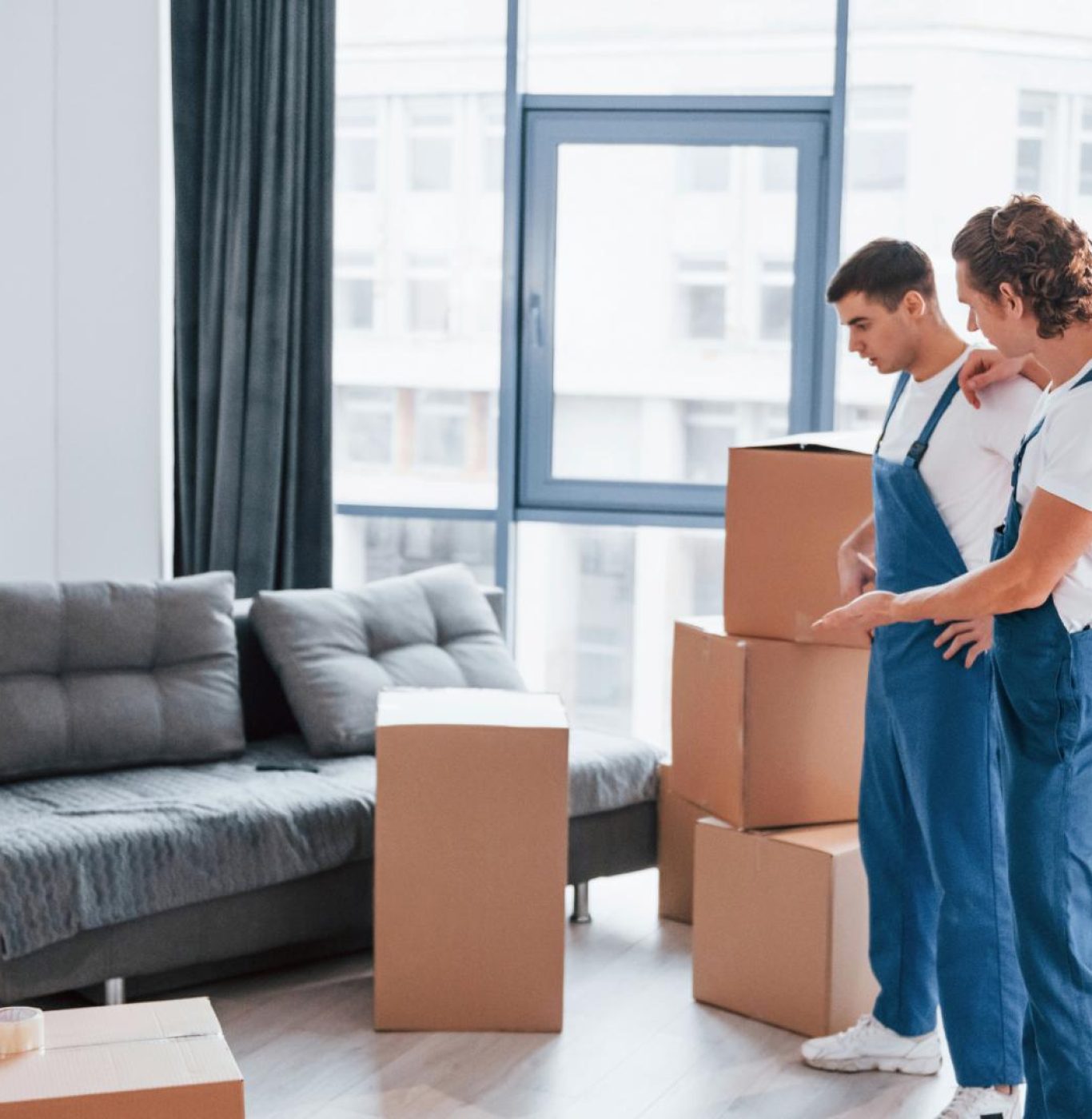 Reliable movers in Missouri City, TX loading furniture for a local residential move