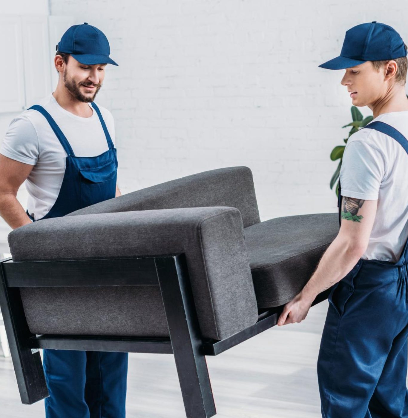 Reliable movers in Pearland, TX loading furniture for a residential move